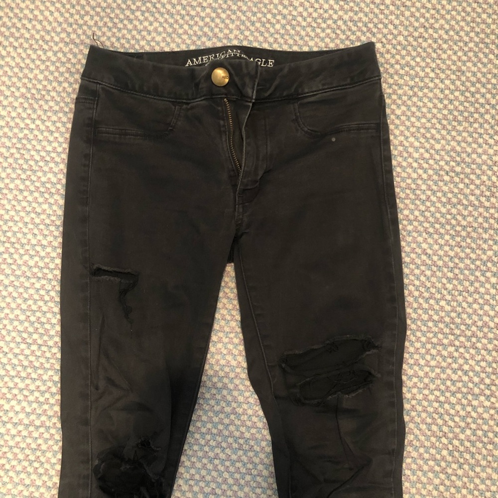Distressed black jeans